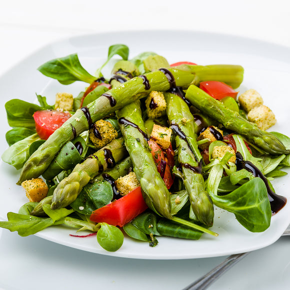 Sweet Balsamic Reduction drizzled over summer salad