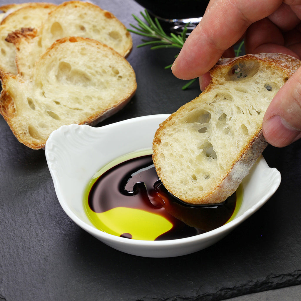 Extra Virgin Olive Oil mixed with Jomeis Sweet Balsamic Reduction and dipping bread